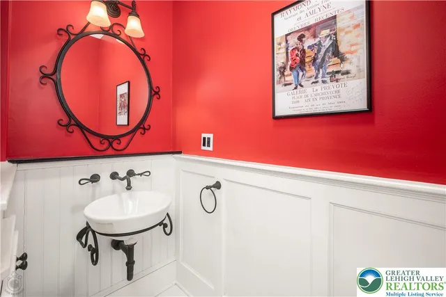 a spacious bedroom with a bed and a window