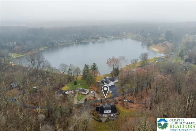 a living room with furniture rug and window