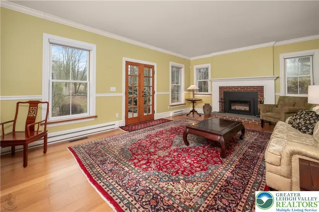 a kitchen with cabinets appliances a sink and a counter top space