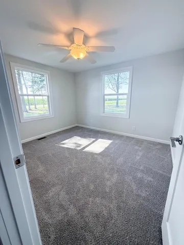 a view of a livingroom with a window