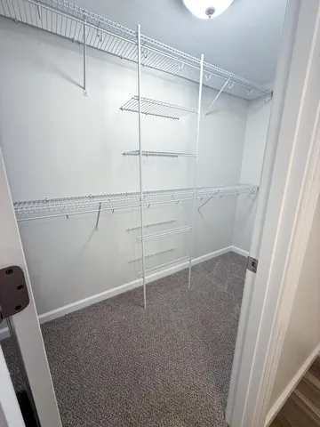 a view of a room with racks on the wall