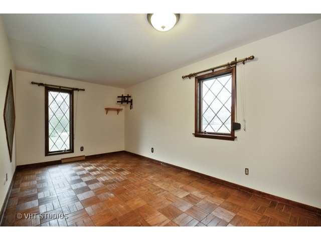 3239 East Bemes Road Crete, IL 60417 - Photo 6 of 10 an empty room with windows