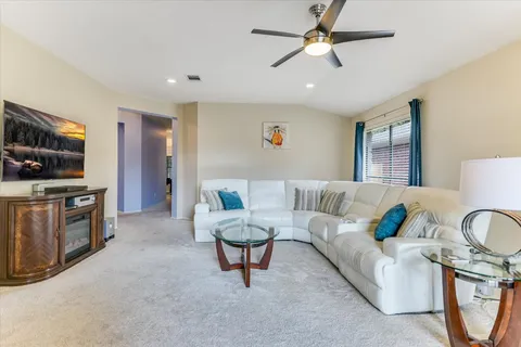 a kitchen with stainless steel appliances granite countertop a sink and stove top oven