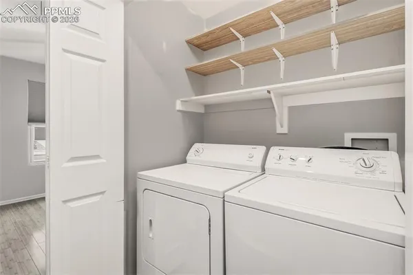 a utility room with dryer and washer