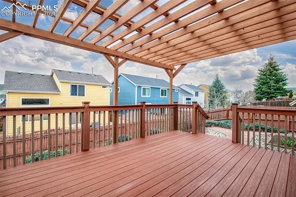 a balcony with wooden floor