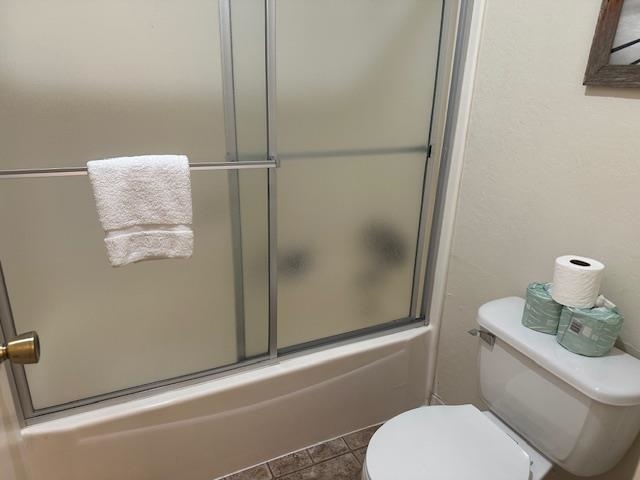 248 Mammoth Slopes, Unit F53 Mammoth Lakes, CA 93546 - Photo 20 of 35 a bathroom with a toilet and a shower