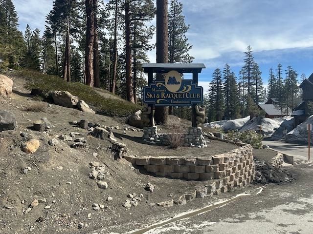 248 Mammoth Slopes, Unit F53 Mammoth Lakes, CA 93546 - Photo 2 of 35 a view of a street with benches