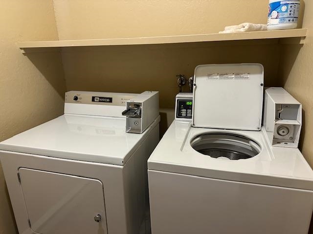 248 Mammoth Slopes, Unit F53 Mammoth Lakes, CA 93546 - Photo 28 of 35 a utility room with dryer and washer
