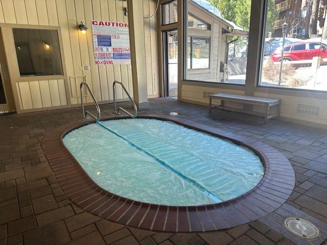 248 Mammoth Slopes, Unit F53 Mammoth Lakes, CA 93546 - Photo 29 of 35 swimming pool with outdoor seating