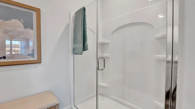 a bathroom with a sink double vanity and a mirror