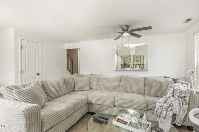 a living room with furniture and a couch
