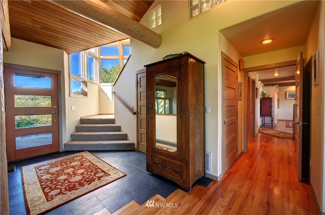 25 Black Road Omak, WA 98841 - Photo 3 of 38 a view of hallway with wooden floor and stairs