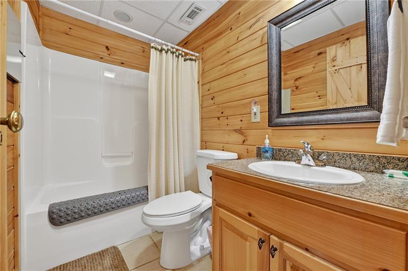 100 Arrow Way Mineral Bluff, GA 30559 - Photo 39 of 53 a bathroom with a granite countertop sink mirror vanity and toilet