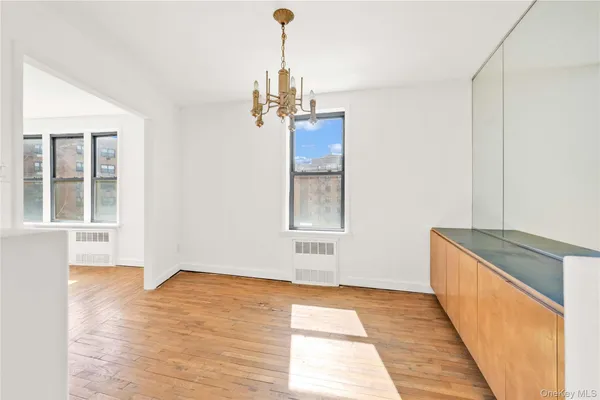 a view of a kitchen from the hallway