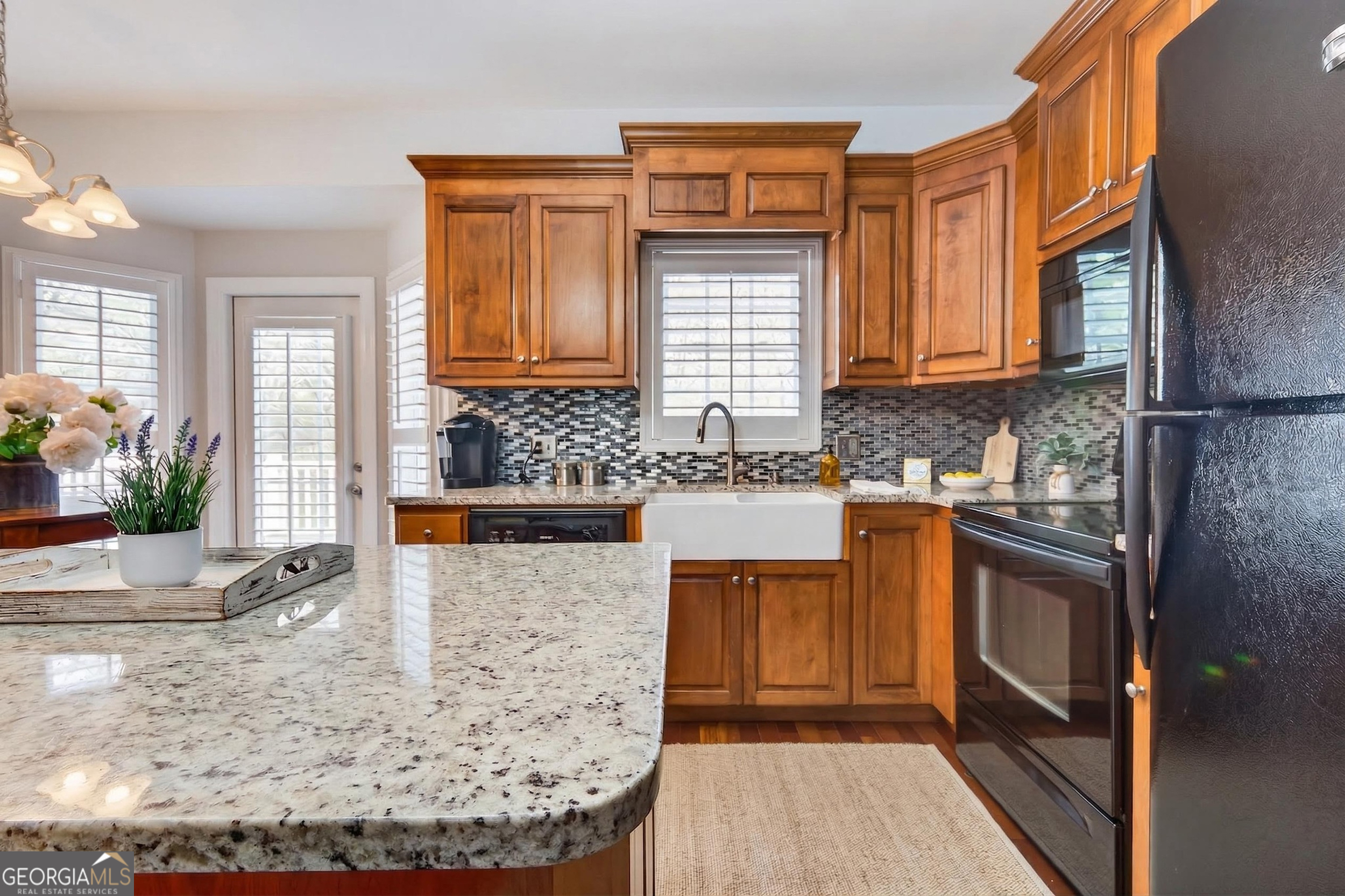 1071 Louden Ridge Road Alto, GA 30510 - Photo 15 of 81 a kitchen with stainless steel appliances granite countertop a stove a sink and a microwave