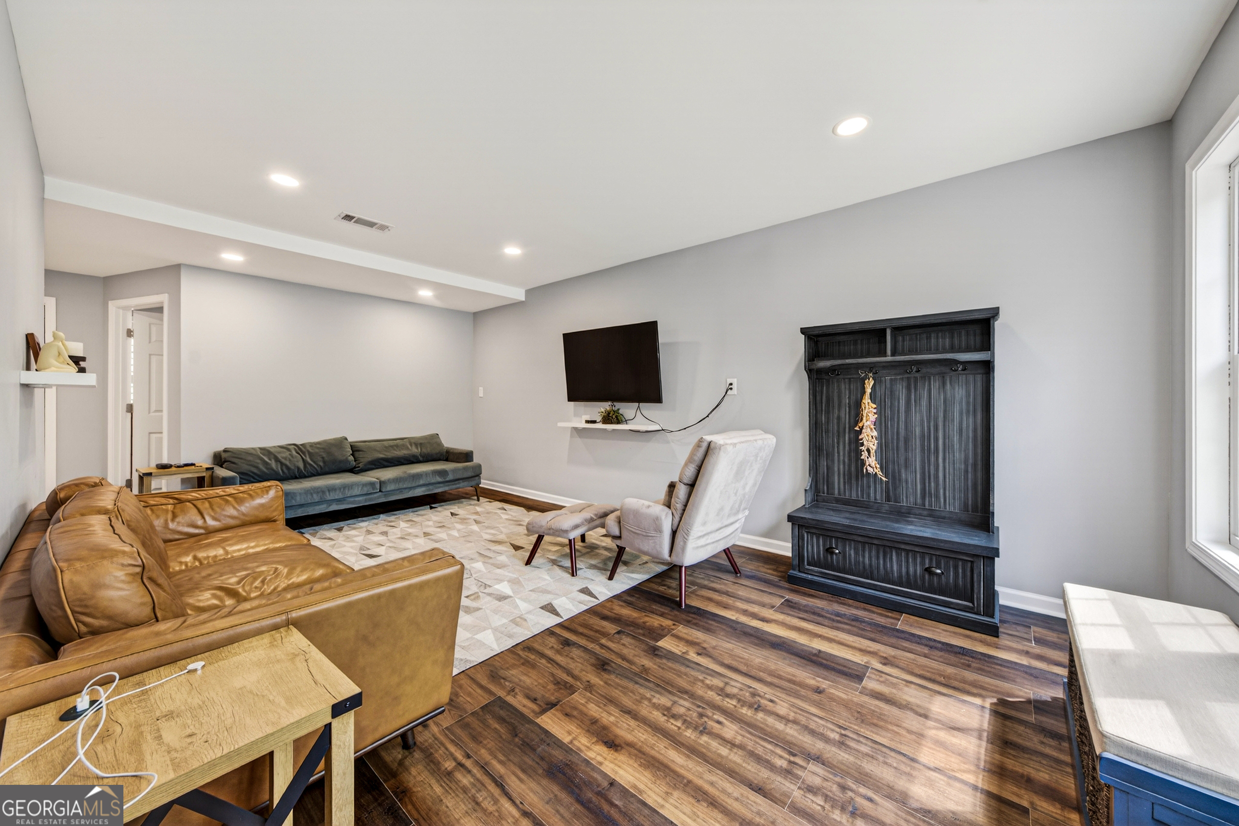 1071 Louden Ridge Road Alto, GA 30510 - Photo 2 of 81 a living room with furniture and a flat screen tv