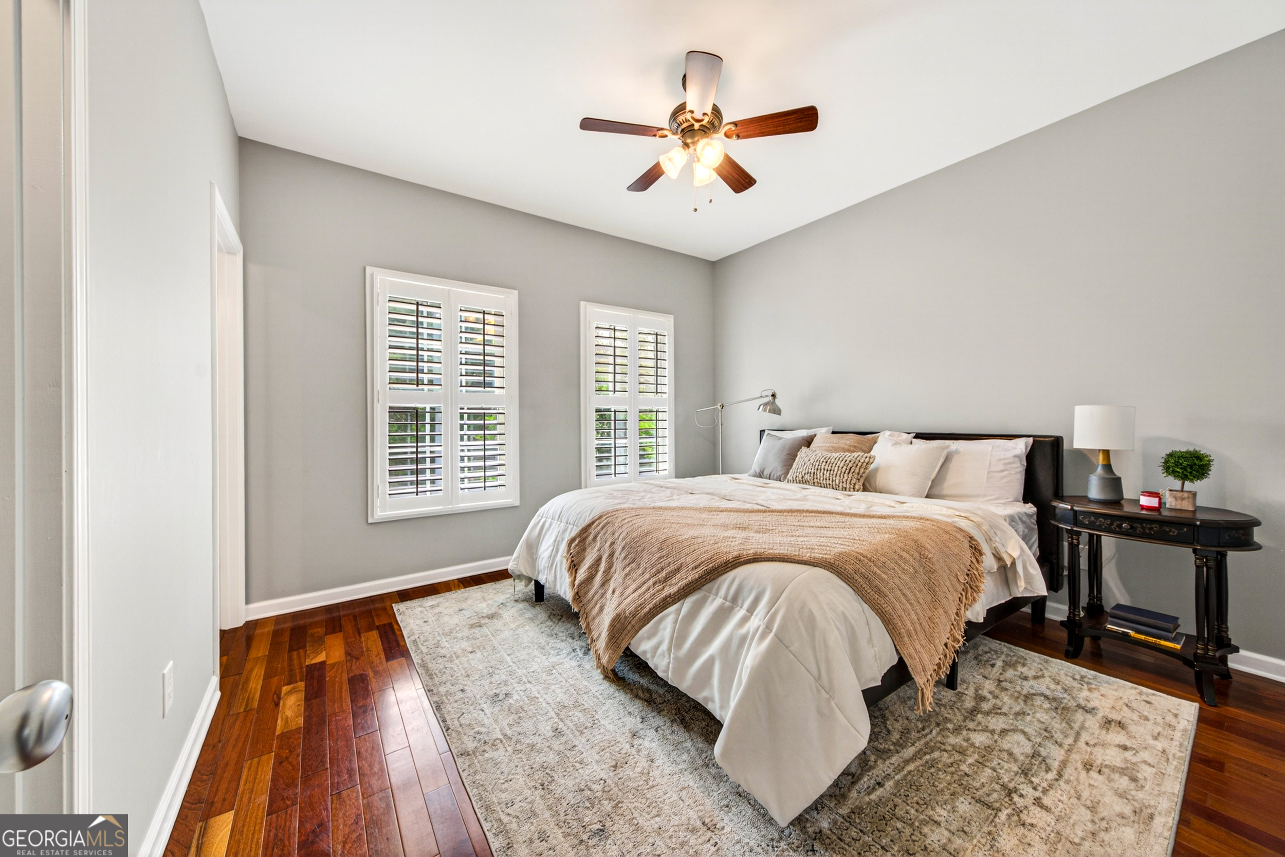 1071 Louden Ridge Road Alto, GA 30510 - Photo 21 of 81 a spacious bedroom with a bed and a chandelier