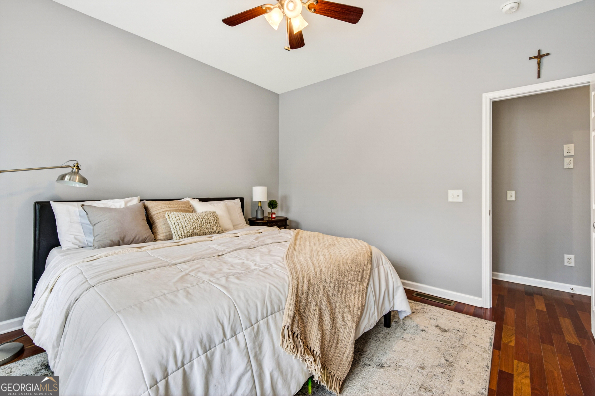 1071 Louden Ridge Road Alto, GA 30510 - Photo 23 of 81 a bedroom with a bed and a chandelier