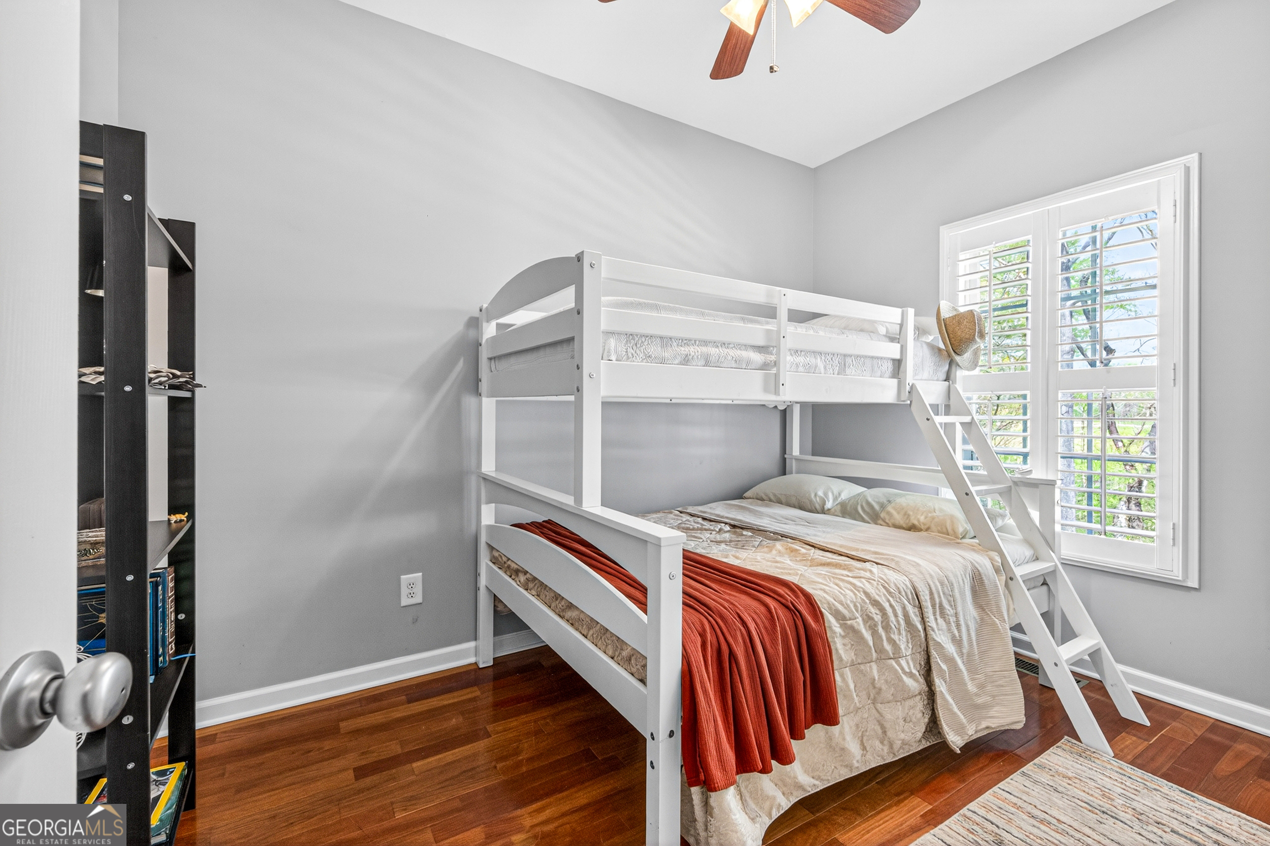 1071 Louden Ridge Road Alto, GA 30510 - Photo 28 of 81 a bedroom with a bed and wooden floor