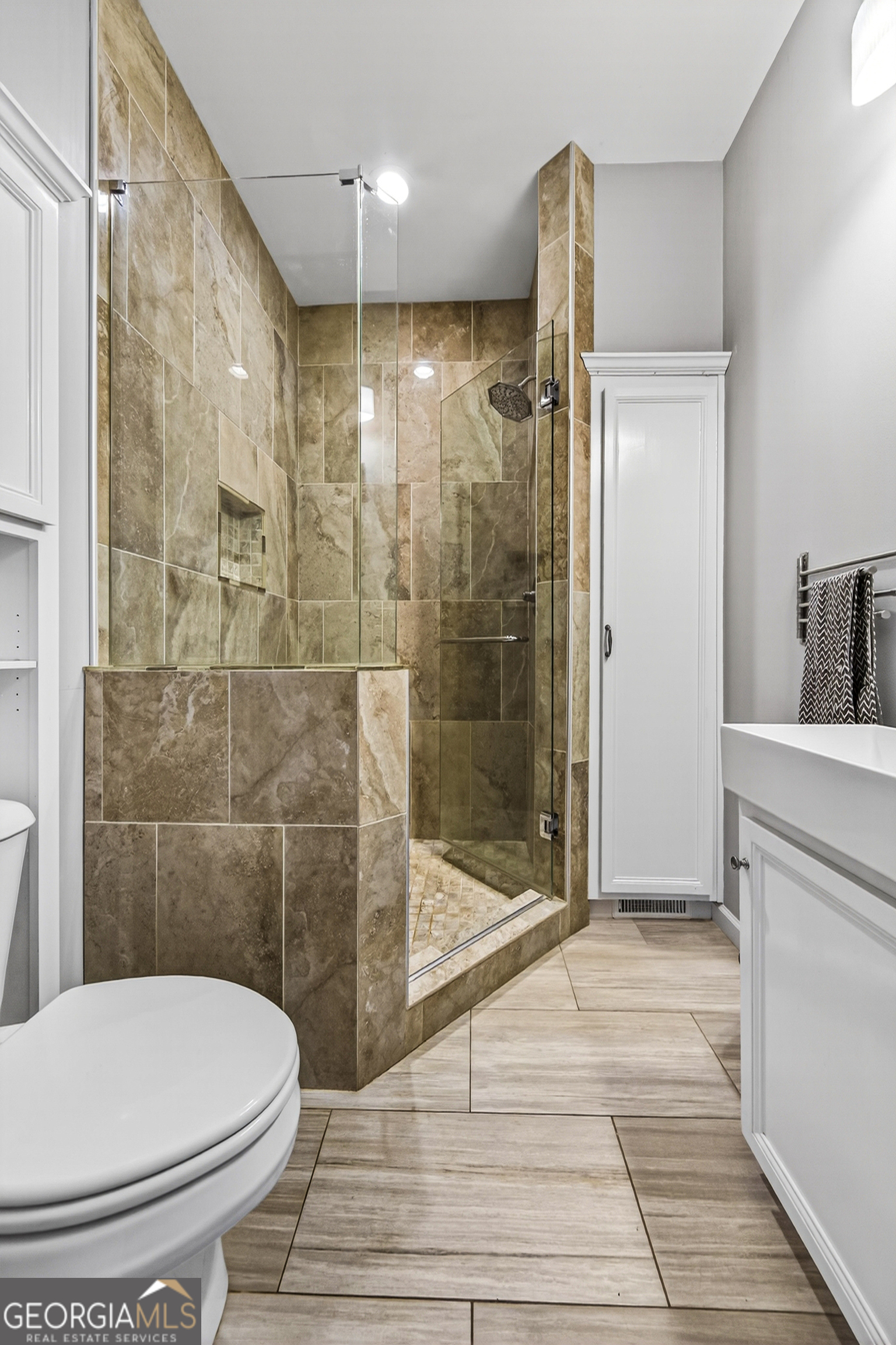 1071 Louden Ridge Road Alto, GA 30510 - Photo 30 of 81 a bathroom with a toilet and a shower