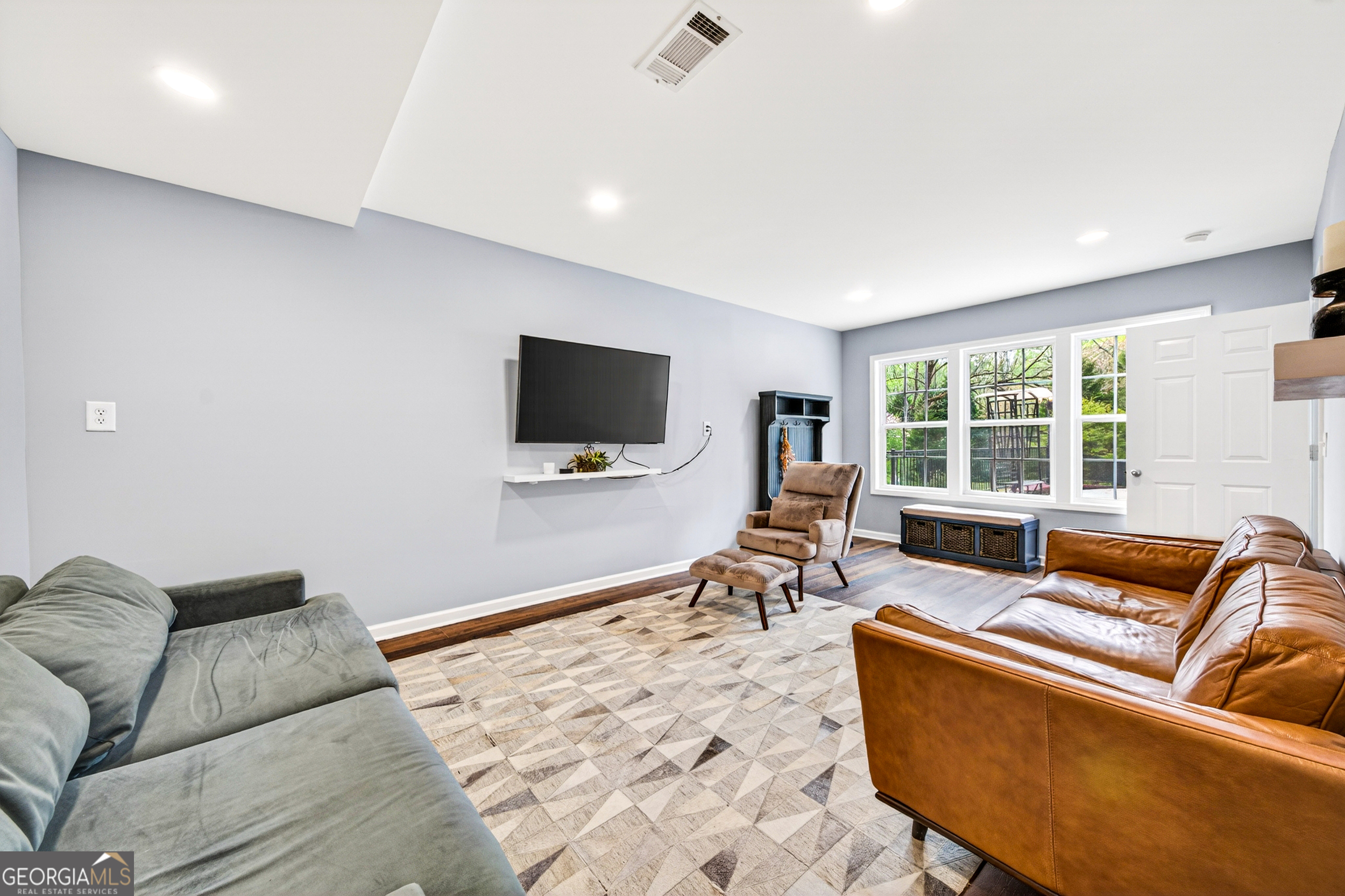1071 Louden Ridge Road Alto, GA 30510 - Photo 3 of 81 a living room with furniture and a flat screen tv