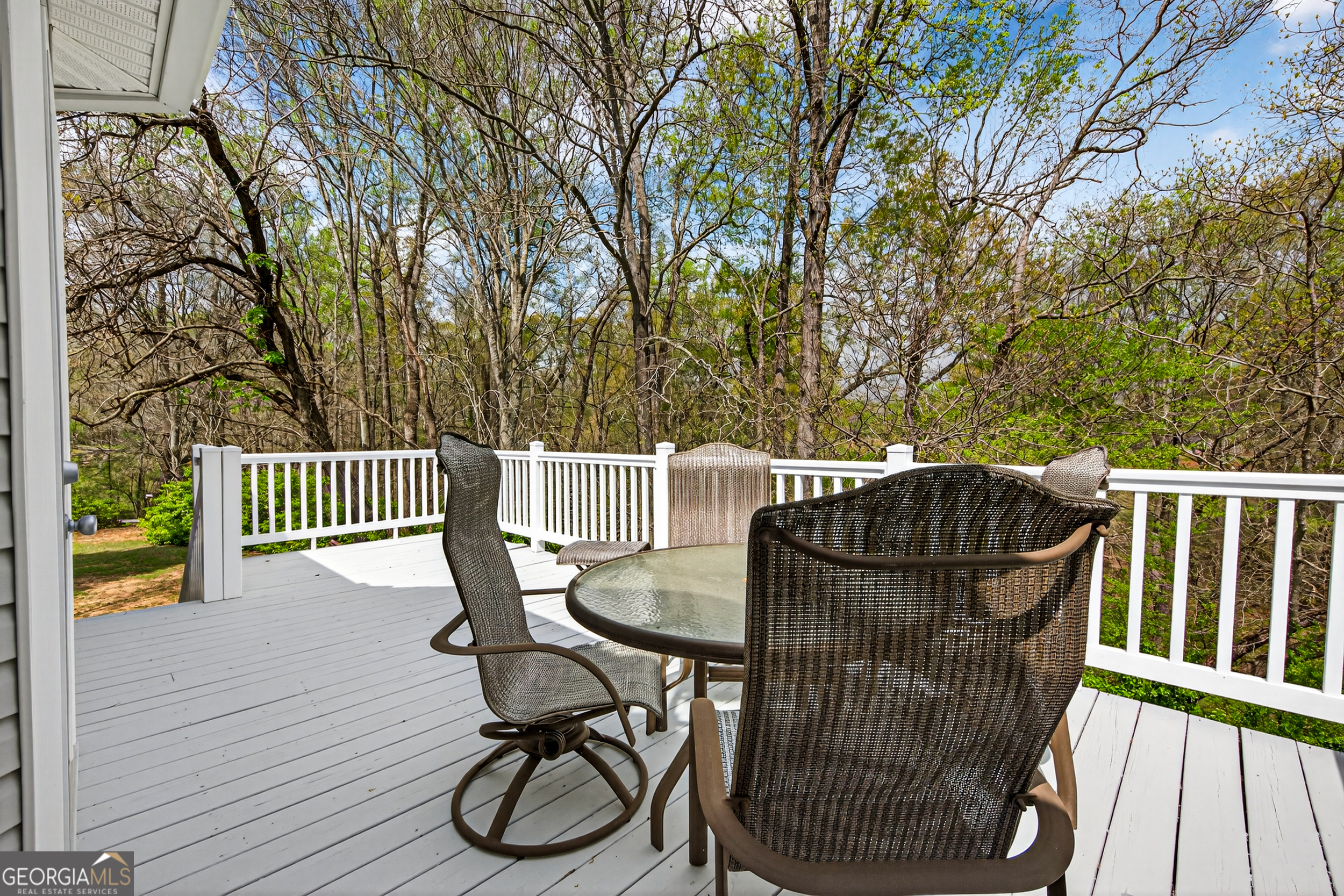 1071 Louden Ridge Road Alto, GA 30510 - Photo 36 of 81 a view of a chair and table on the wooden floor