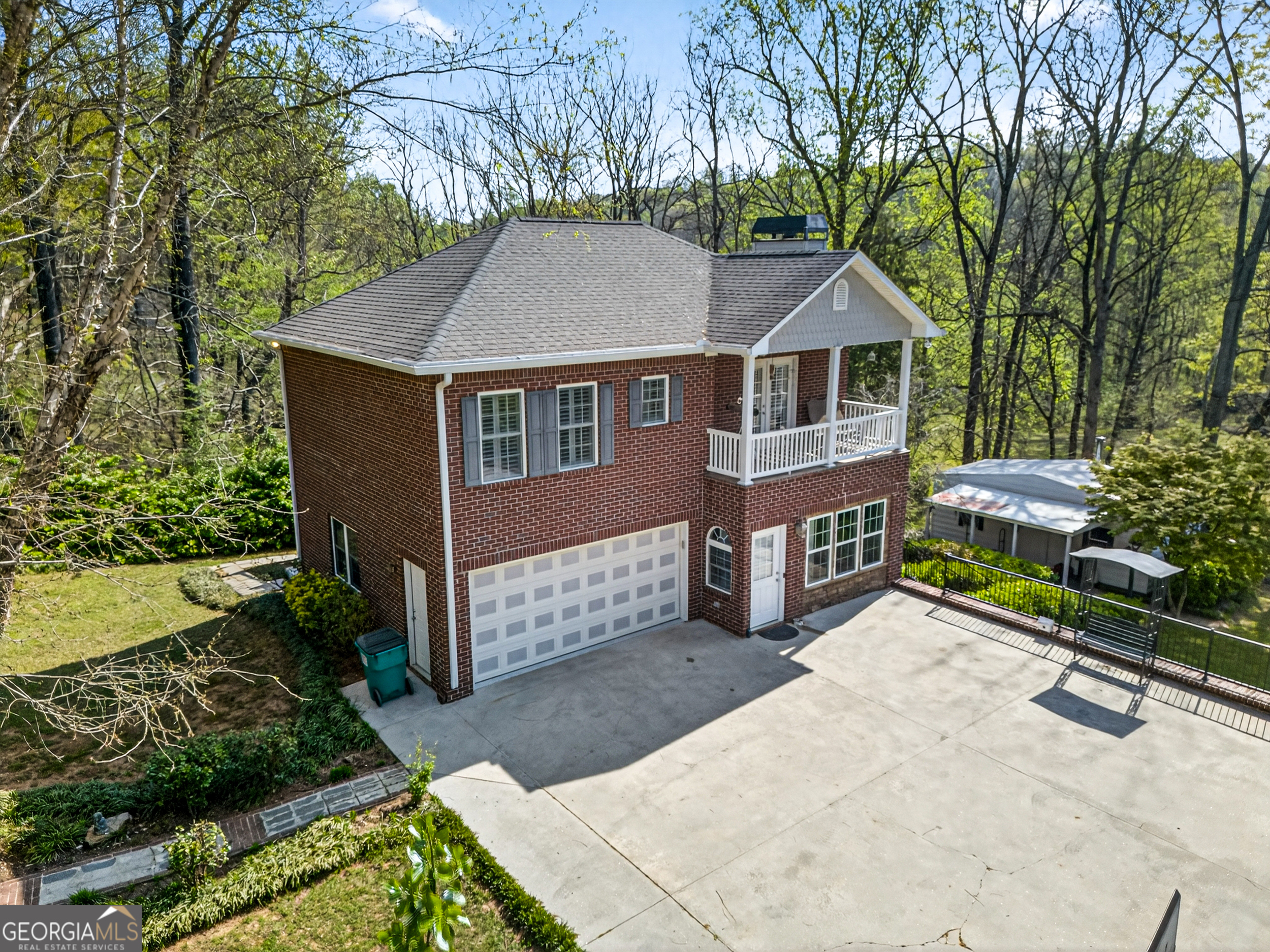1071 Louden Ridge Road Alto, GA 30510 - Photo 52 of 81 a front view of a house with a yard and garage