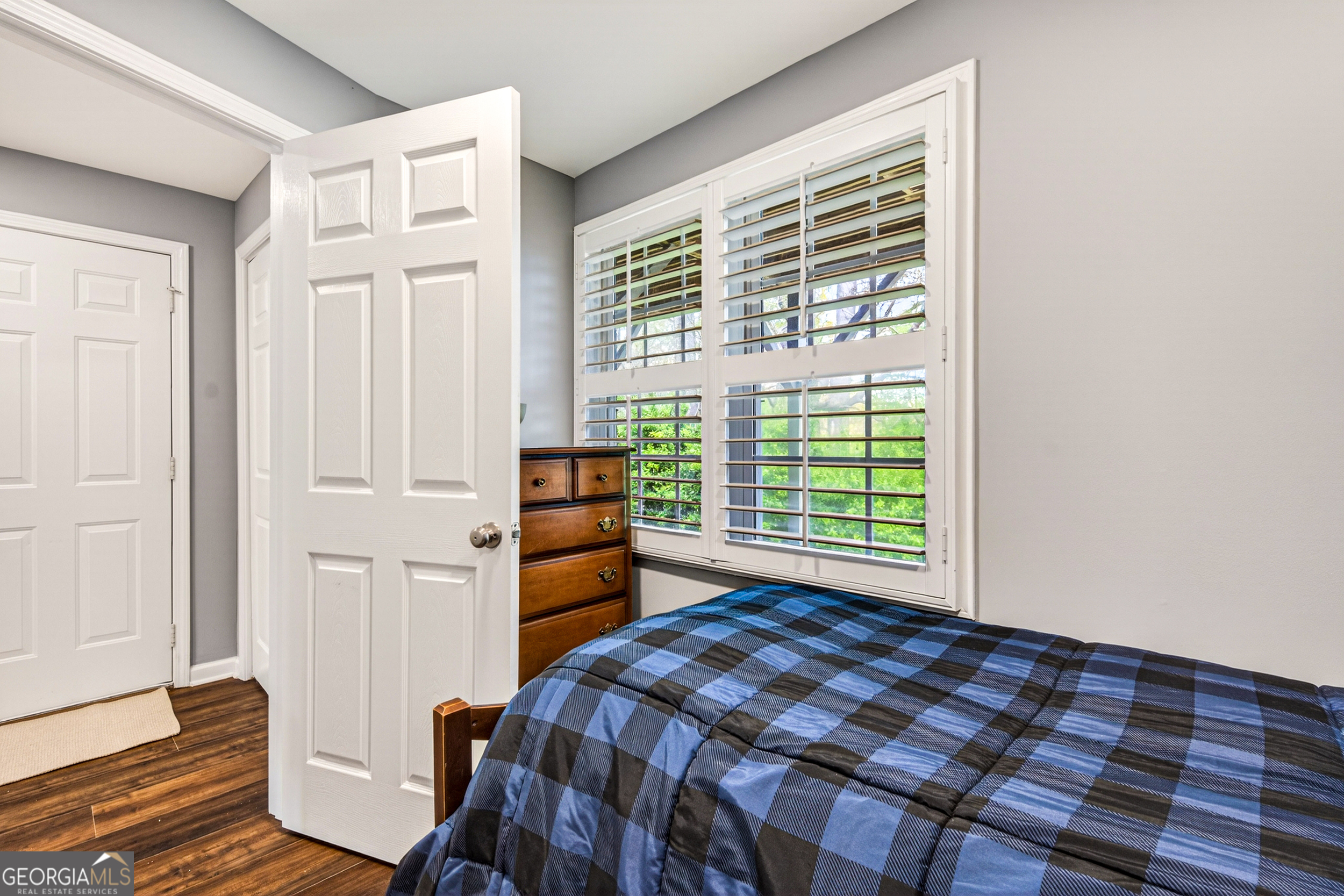 1071 Louden Ridge Road Alto, GA 30510 - Photo 6 of 81 a bedroom with a bed and wooden floor