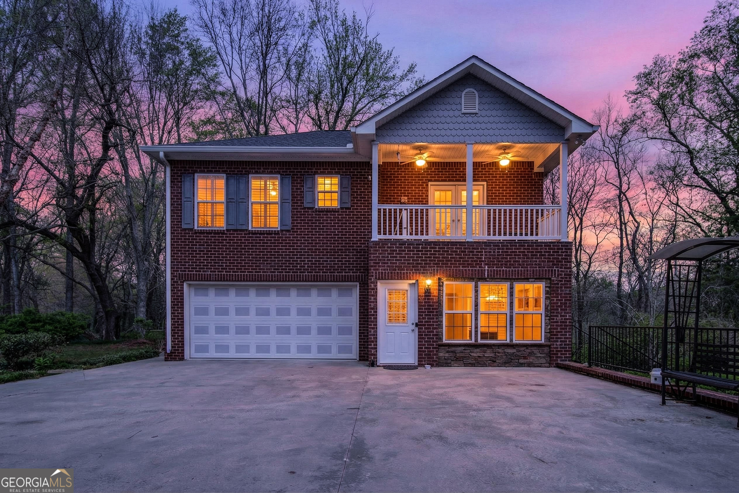 1071 Louden Ridge Road Alto, GA 30510 - Photo 78 of 81 a front view of a house with a yard and garage