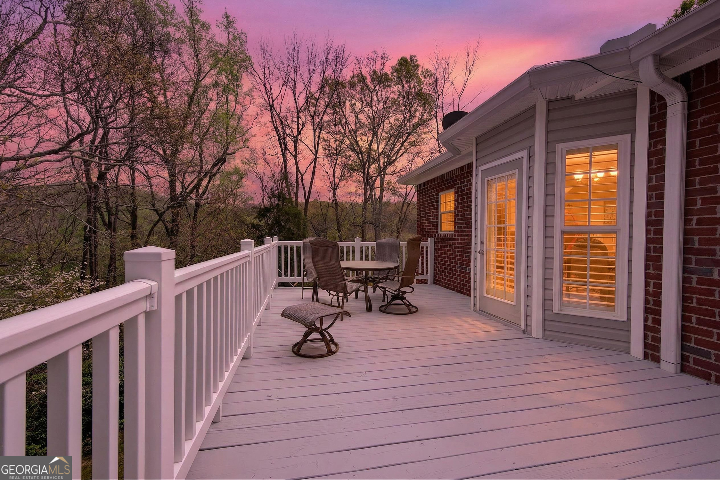 1071 Louden Ridge Road Alto, GA 30510 - Photo 79 of 81 a view of a deck with wooden floor and chairs