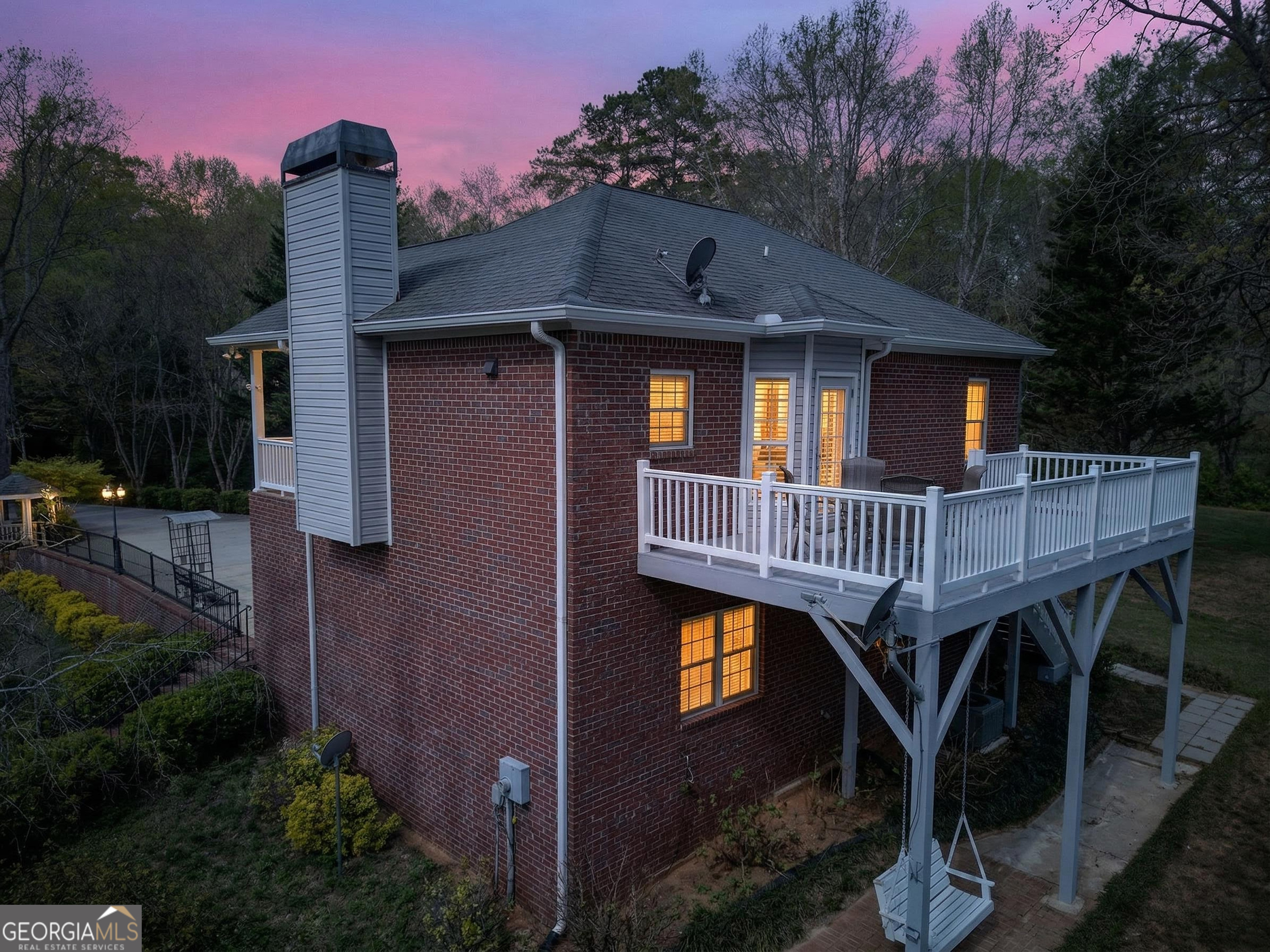 1071 Louden Ridge Road Alto, GA 30510 - Photo 80 of 81 a front view of a house with a garden and deck