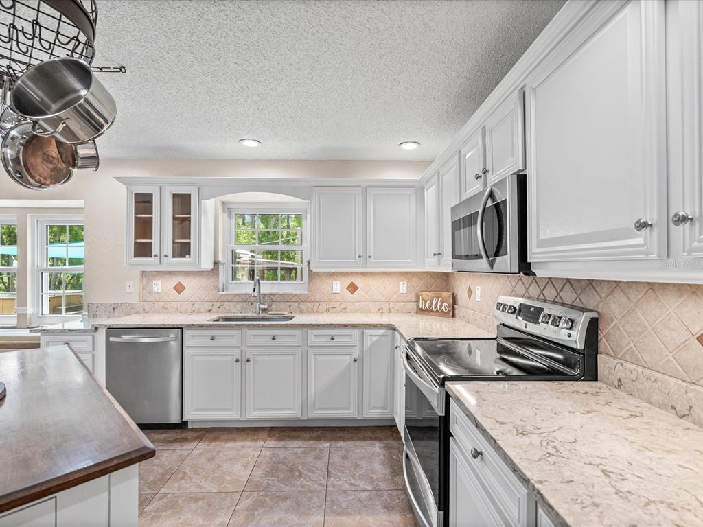 14204 Highgrove Road Spring Hill, FL 34609 - Photo 27 of 70 Gallery Image 27