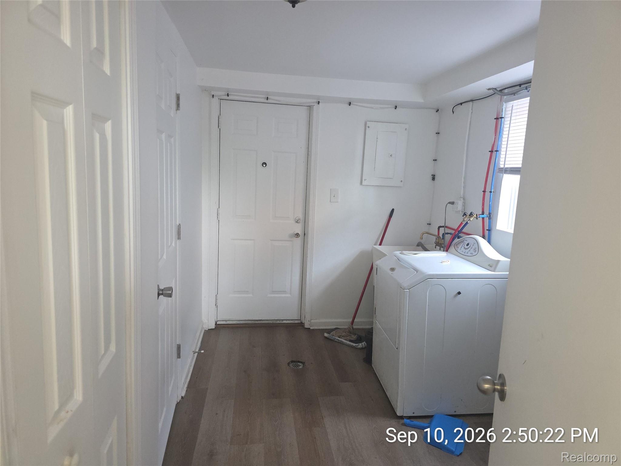 4882 Southfield Road Dearborn Heights, MI 48125 - Photo 5 of 15 Wood-finish flooring with white paneled doors