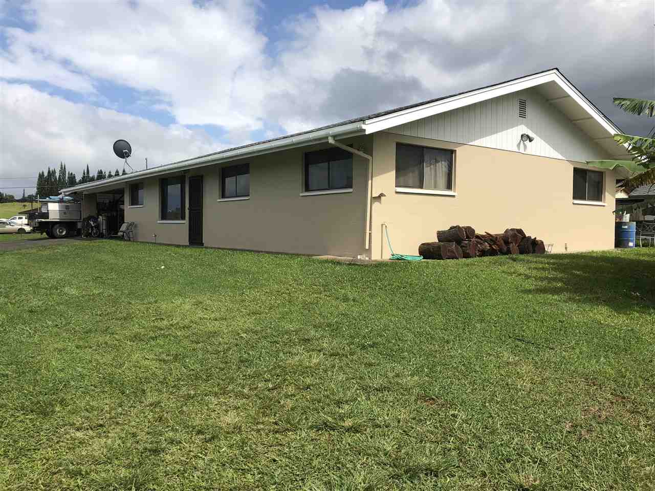 1752 West Kuiaha Road Haiku, HI 96708 - Photo 1 of 24 a front view of house with yard