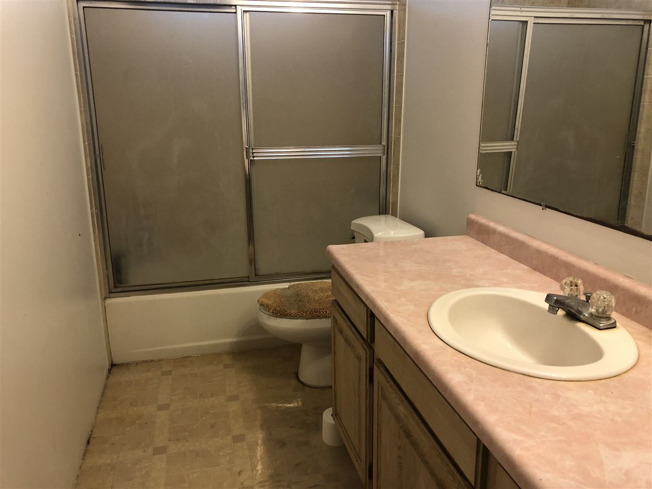 1752 West Kuiaha Road Haiku, HI 96708 - Photo 11 of 24 a bathroom with a sink a toilet and shower