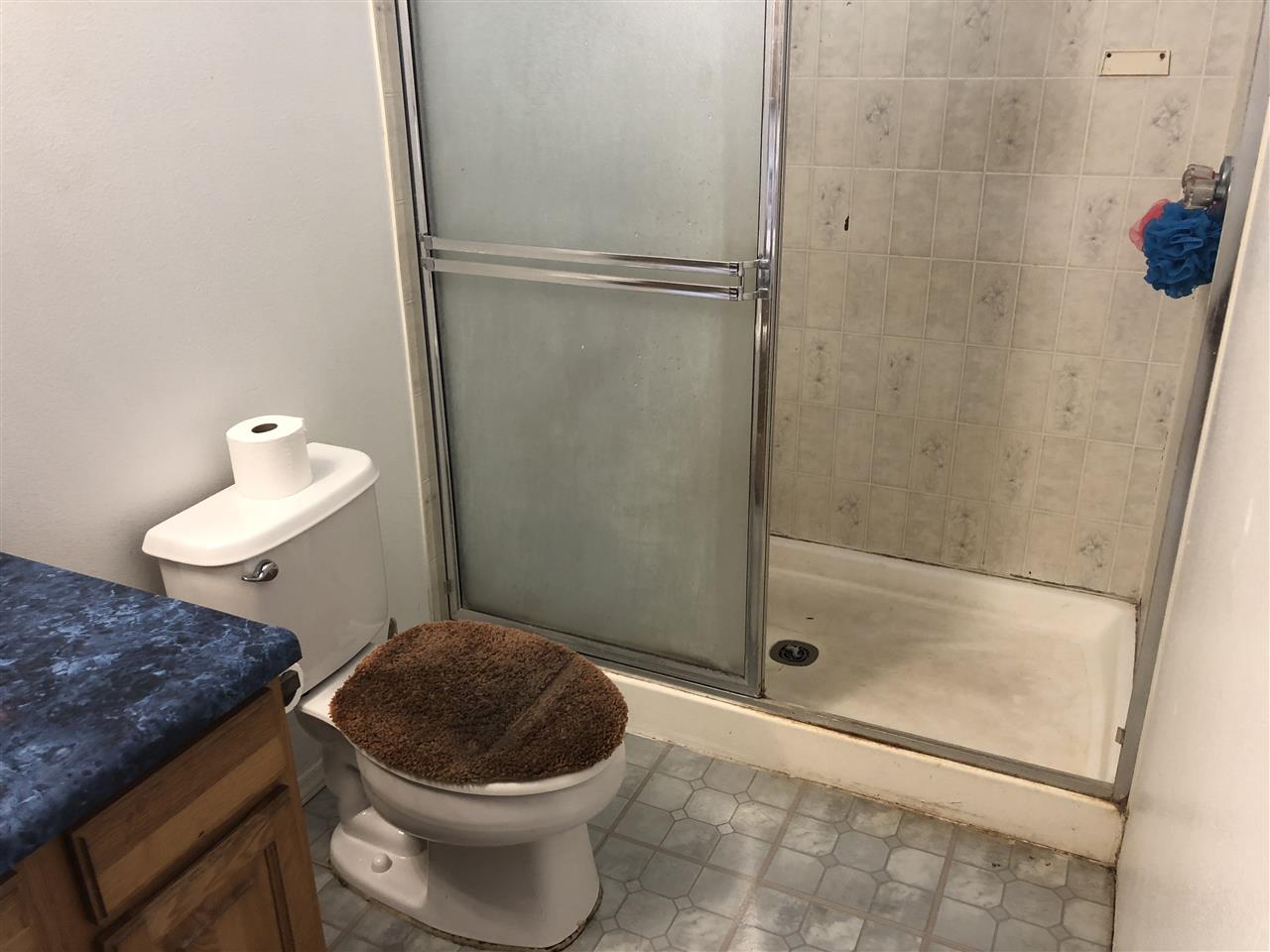 1752 West Kuiaha Road Haiku, HI 96708 - Photo 13 of 24 a bathroom with a toilet and a shower