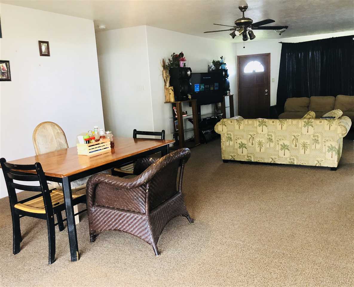 1752 West Kuiaha Road Haiku, HI 96708 - Photo 10 of 24 a living room with furniture and dining table