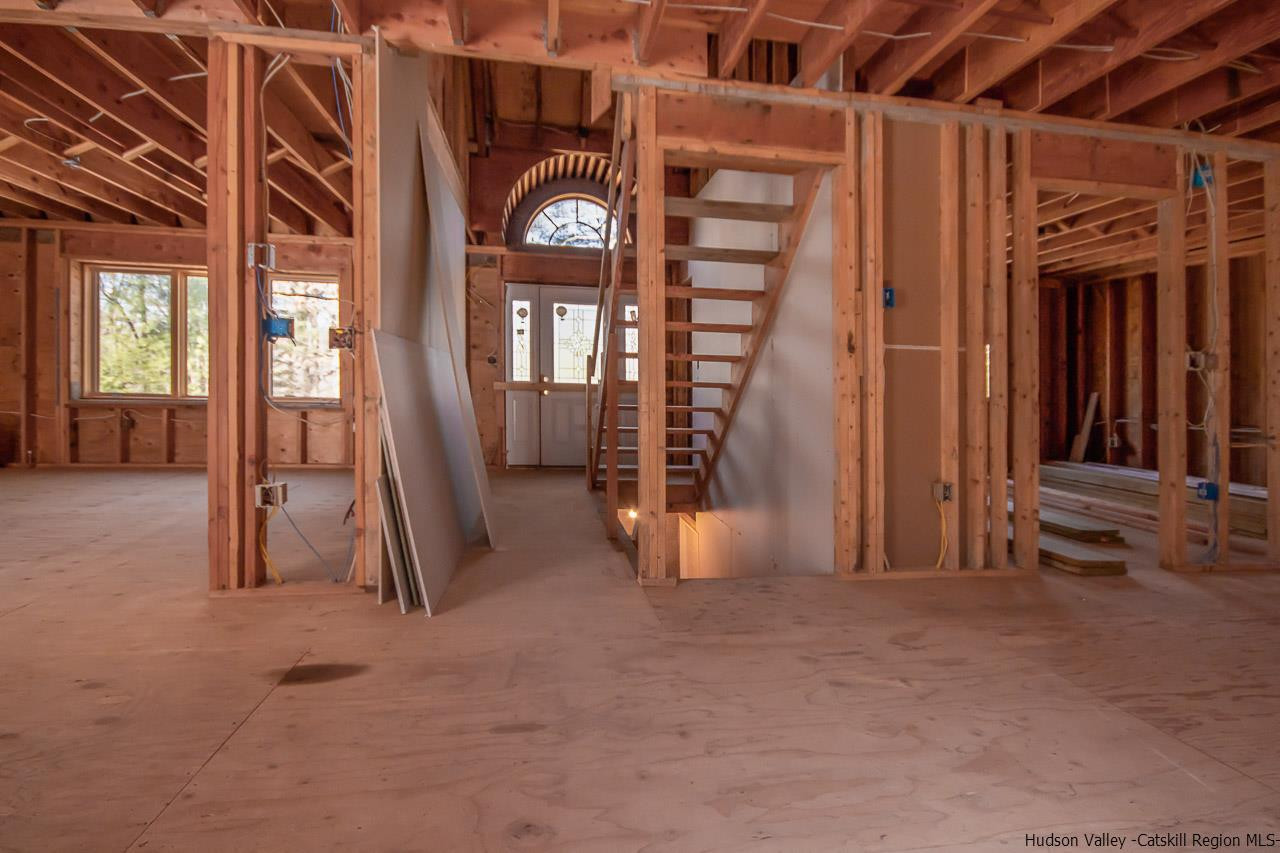 59 Markle Road Kerhonkson, NY 12446 - Photo 12 of 24 a view of an empty room with a balcony
