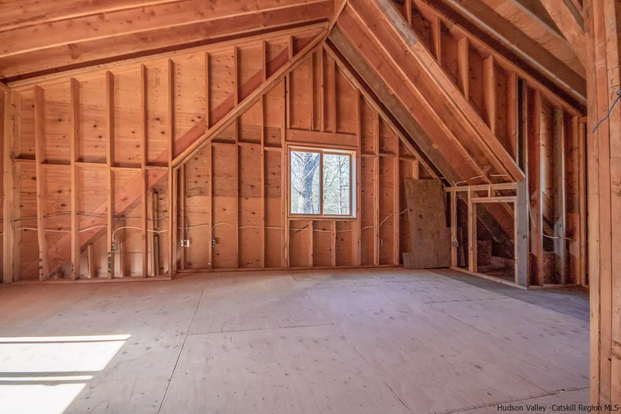 59 Markle Road Kerhonkson, NY 12446 - Photo 19 of 24 a view of an empty room with stairs