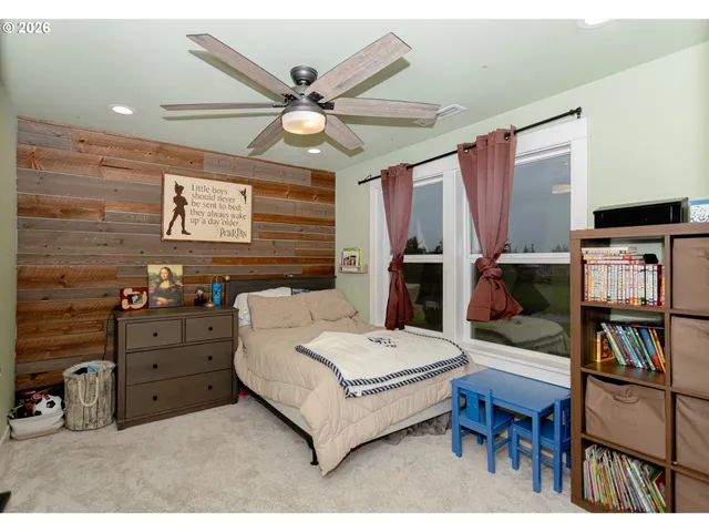 a bed room with a bed and a fish tank