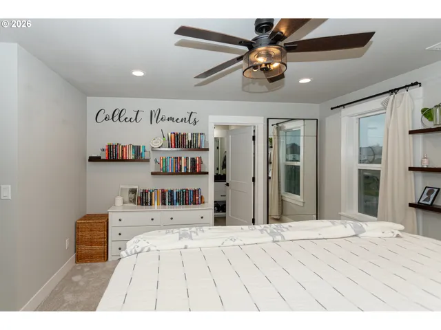 a view of a bedroom with furniture and staircase