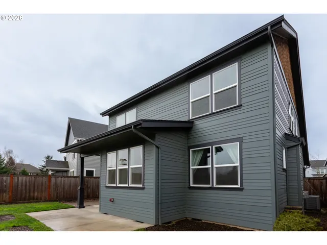 a front view of a house with yard