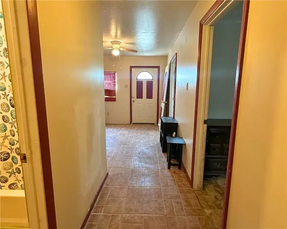 a bathroom with a mirror and a shower