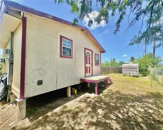 a house view with a outdoor space