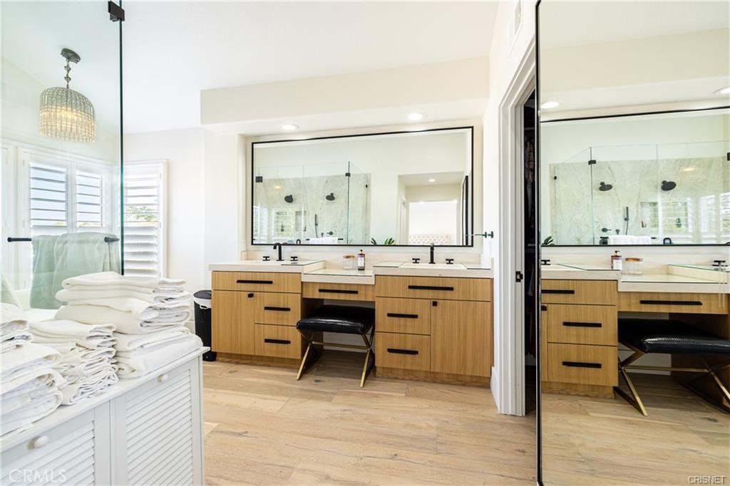 3626 Paseo Primario Calabasas, CA 91302 - Photo 20 of 41 a room with a sink and a dresser