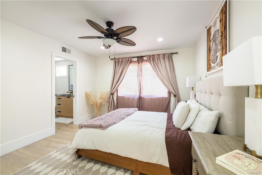 3626 Paseo Primario Calabasas, CA 91302 - Photo 27 of 41 a bedroom with a large bed and a window