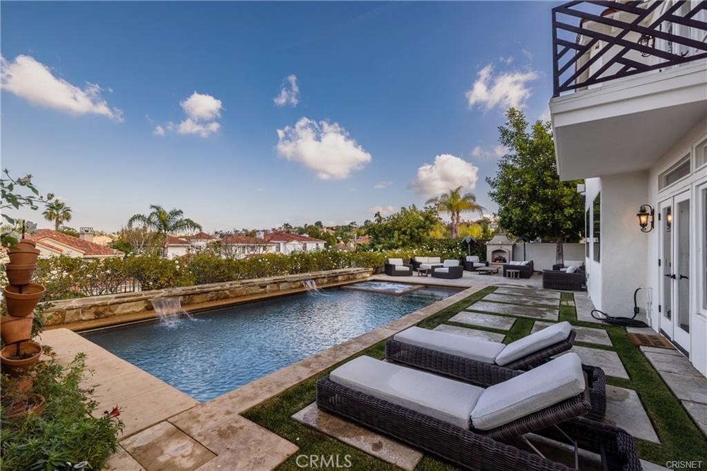 3626 Paseo Primario Calabasas, CA 91302 - Photo 29 of 41 a view of a swimming pool with lounge chair