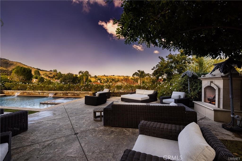 3626 Paseo Primario Calabasas, CA 91302 - Photo 32 of 41 a view of a terrace with couches and a table