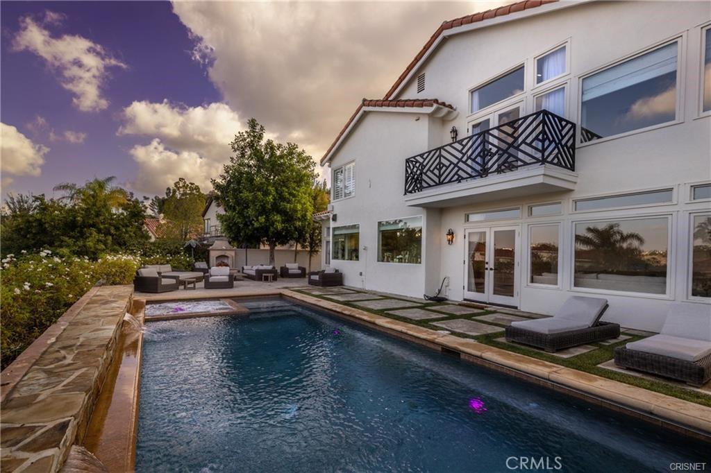 3626 Paseo Primario Calabasas, CA 91302 - Photo 34 of 41 a view of a patio with swimming pool table and chairs