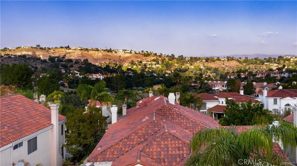 3626 Paseo Primario Calabasas, CA 91302 - Photo 36 of 41 a view of a city with sunset